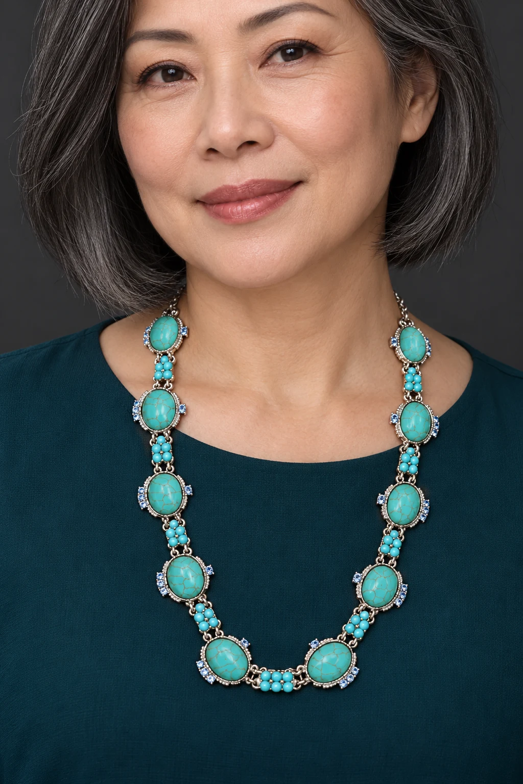 The Philomène Jardin Blue Necklace worn on a model — AI-generated styling preview