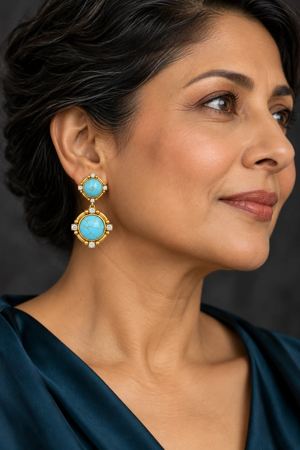 The Gabrielle Waltz Turquoise Blue Earrings worn on a model — AI-generated styling preview
