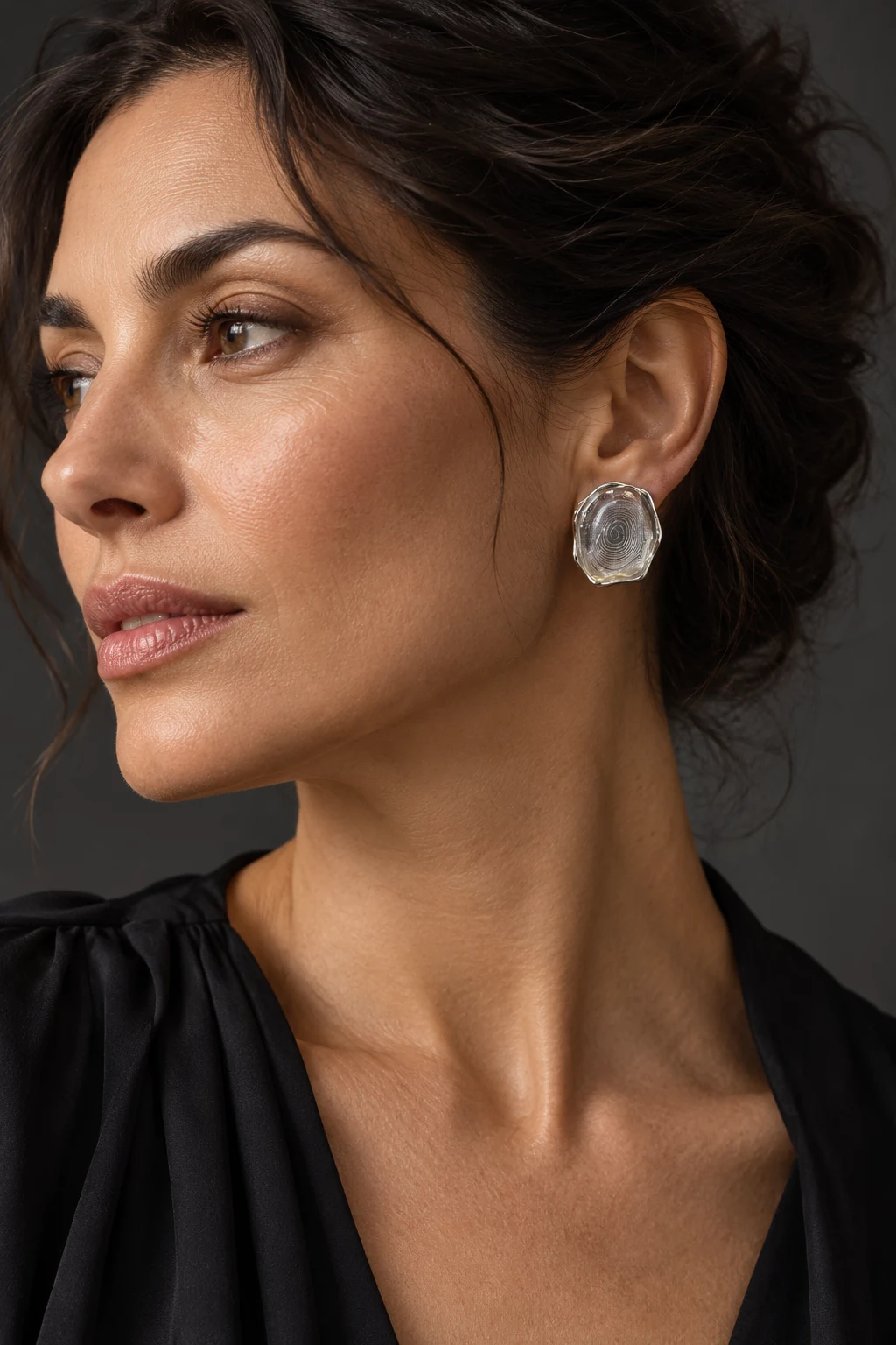 The Théa Éclat Earrings worn on a model — AI-generated styling preview