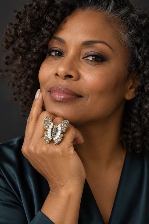 The Adrienne Sonnet Ring worn on a model — AI-generated styling preview