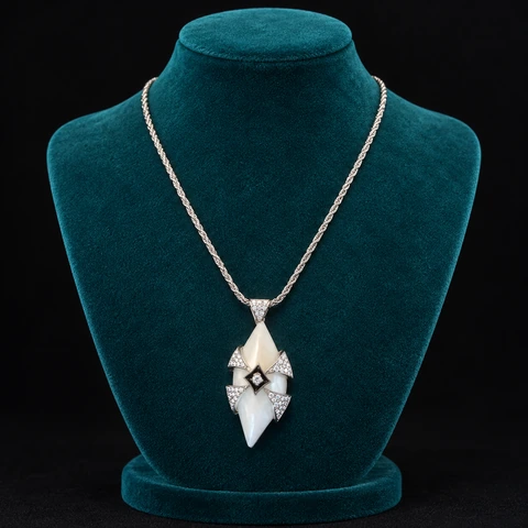 The Noémie Silver-Tone Necklace on a jewelry display — AI-generated styling preview