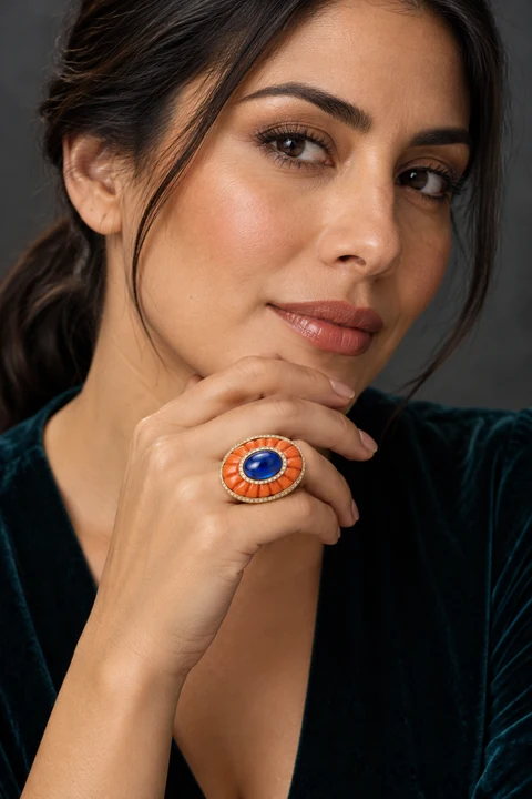 The Monique Éclat Orange Ring worn on a model — AI-generated styling preview