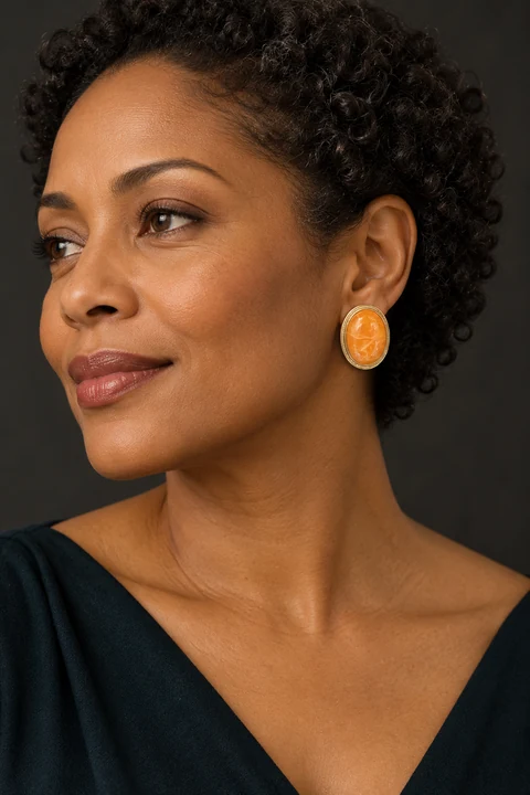 The Larkspur Orange Earrings worn on a model — AI-generated styling preview