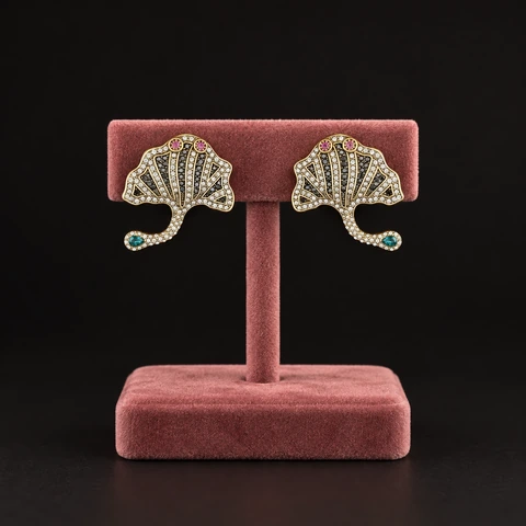 The Éveline Muse Earrings on a jewelry display — AI-generated styling preview