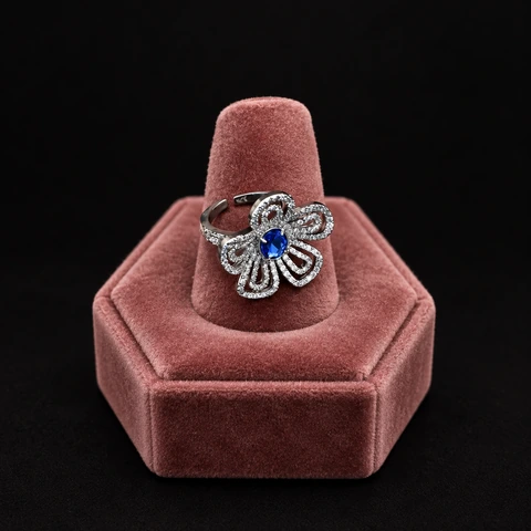The Margaux Romance Ring on a jewelry display — AI-generated styling preview