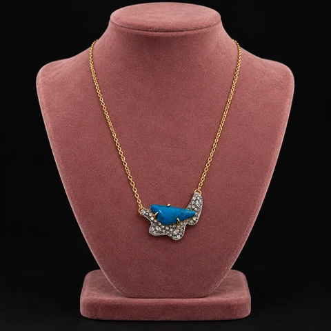 The Alma Fable Necklace on a jewelry display — AI-generated styling preview