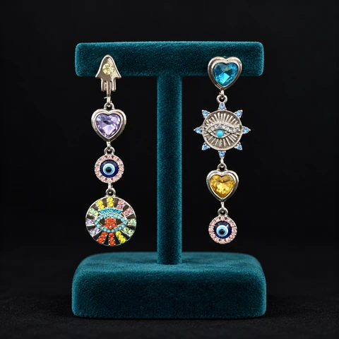 The Léonie Romance Earrings on a jewelry display — AI-generated styling preview
