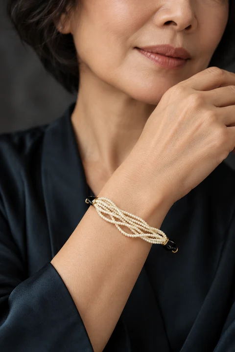 The Claire Promenade Bracelet worn on a model — AI-generated styling preview