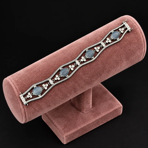 The Virginie Poème Grey Bracelet on a jewelry display — AI-generated styling preview