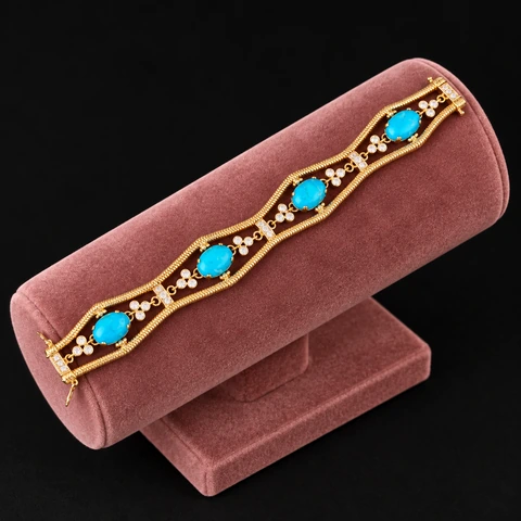The Virginie Poème Blue Bracelet on a jewelry display — AI-generated styling preview