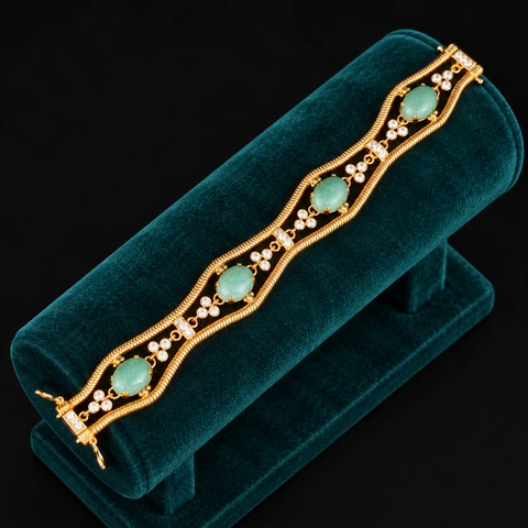 The Virginie Poème Green Bracelet on a jewelry display — AI-generated styling preview