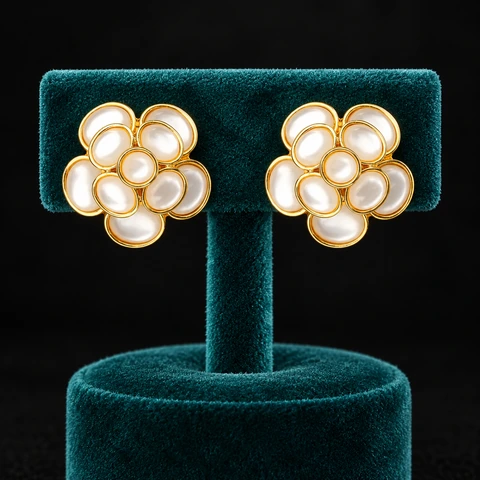 The Camélia Earrings on a jewelry display — AI-generated styling preview