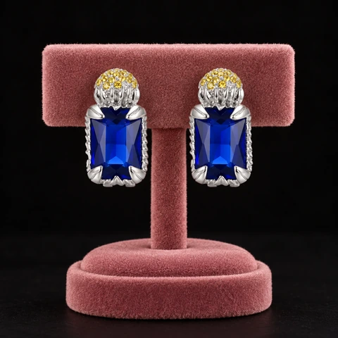 The Romy Arabesque Blue Earrings on a jewelry display — AI-generated styling preview