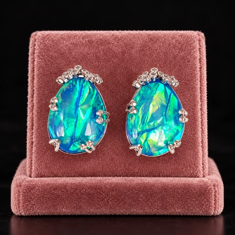 The Clarisse Arabesque Earrings on a jewelry display — AI-generated styling preview
