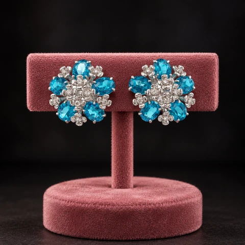 The Zoé Arabesque Earrings on a jewelry display — AI-generated styling preview
