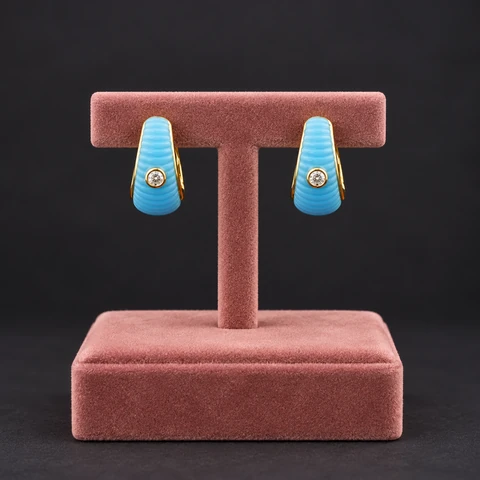 The Léonie Fleur Earrings on a jewelry display — AI-generated styling preview