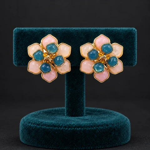 The Camille Arabesque Earrings on a jewelry display — AI-generated styling preview