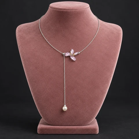 The Rose Rhapsody Necklace on a jewelry display — AI-generated styling preview