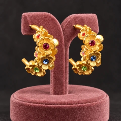 The Mathilde Fleur Earrings on a jewelry display — AI-generated styling preview