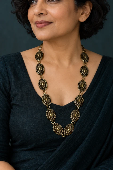 The Clara Arabesque Necklace worn on a model — AI-generated styling preview