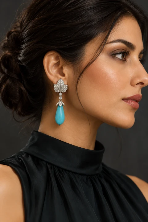 The Claudine Sonnet Blue Earrings worn on a model — AI-generated styling preview